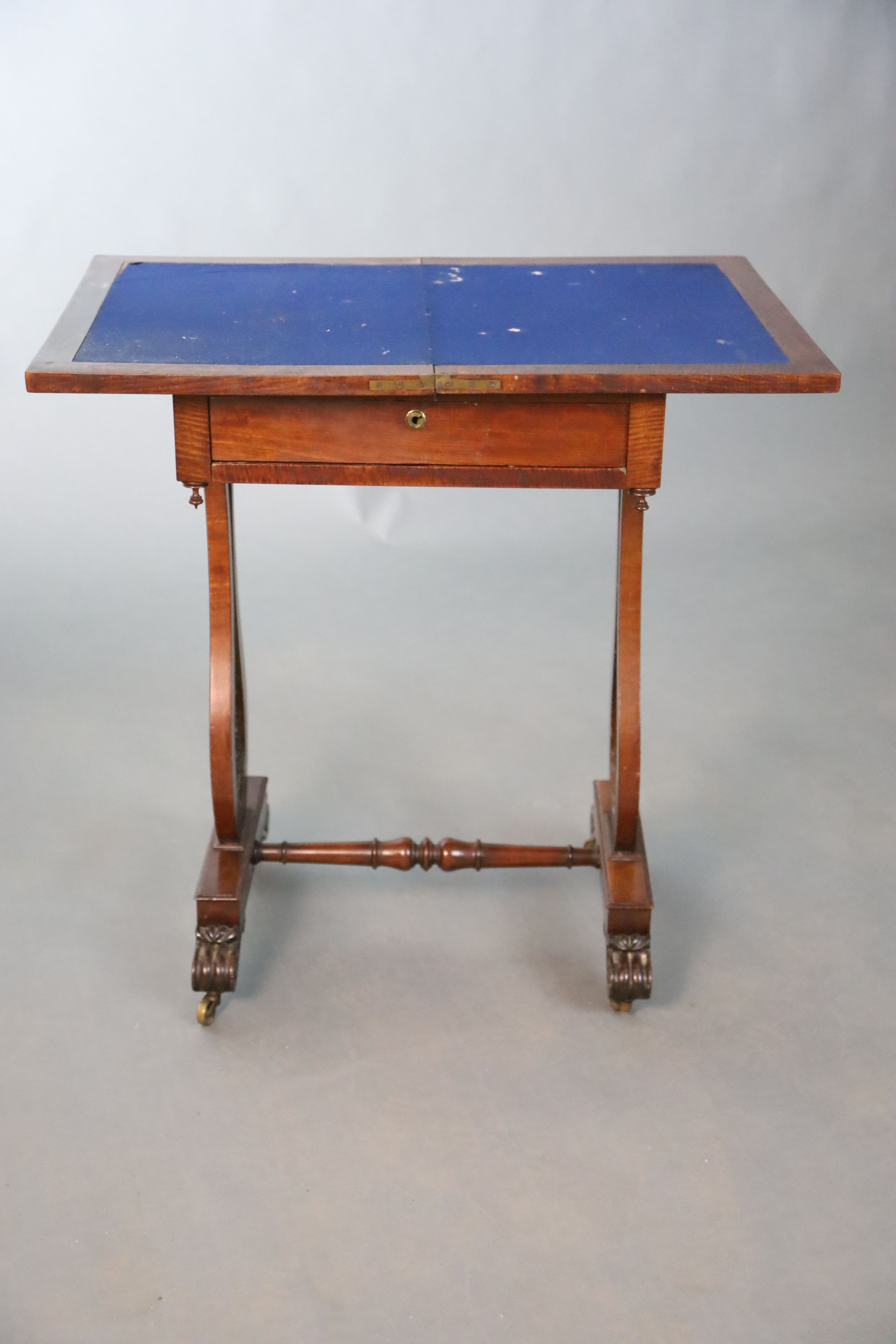 An early Victorian mahogany games / work table, W.53.5cm D.38cm H.76.5cm